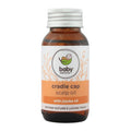 Baby Nature Cradle Cap Scalp Oil in an amber glass bottle with a white cap and a white and orange label, shown on a plain white background.